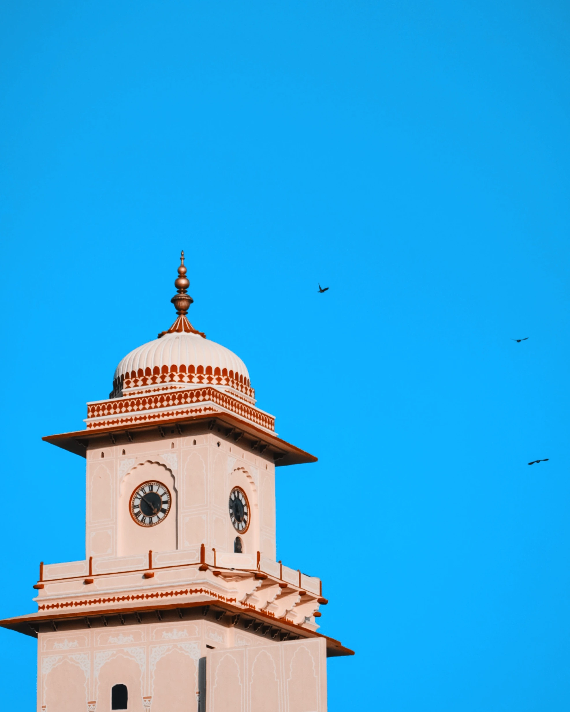 a shot of City Palace Jaipur against a blue afternoon sky