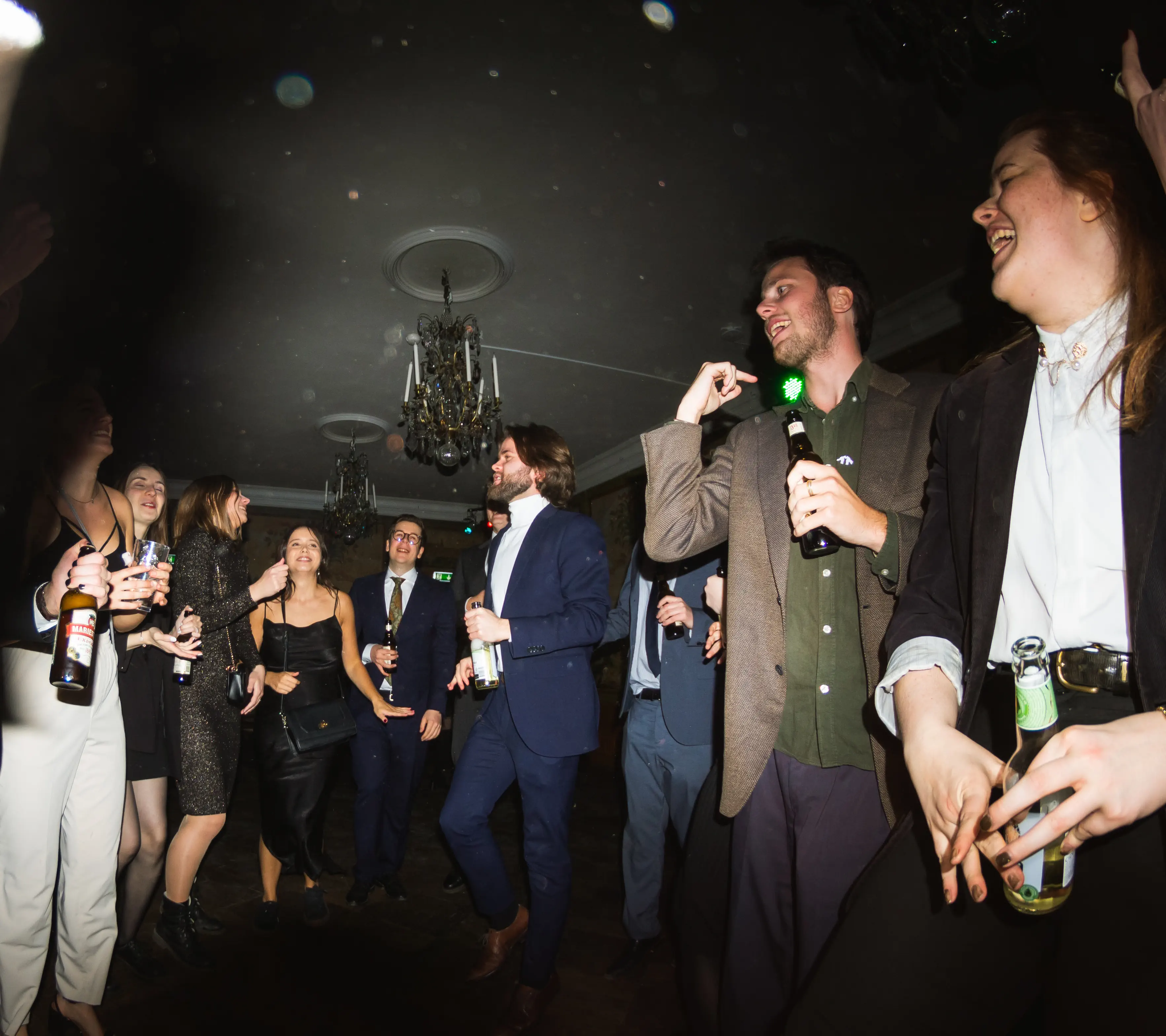 A group of people dancing on the dancefloor at Västgöta Nation, Uppsala